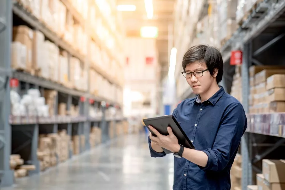 A warehouse manager applies inventory management best practices on-ground.